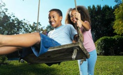 Children playing on swingset